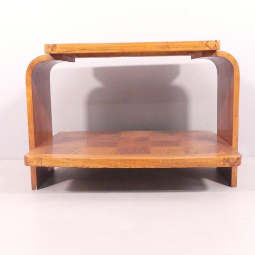 2008 - A 1930s two-tier Art Deco coffee table with geometric parquetry surfaces. 76x54x58.5cm.