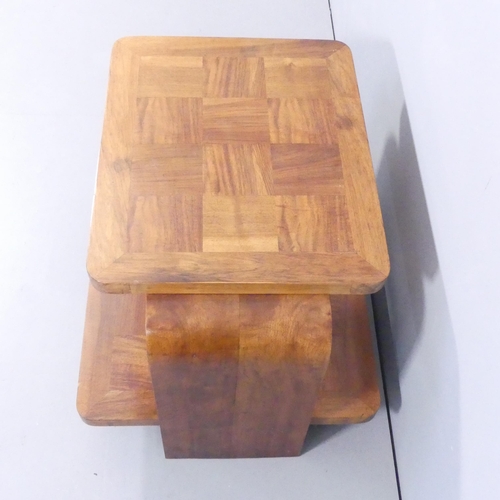 2008 - A 1930s two-tier Art Deco coffee table with geometric parquetry surfaces. 76x54x58.5cm.