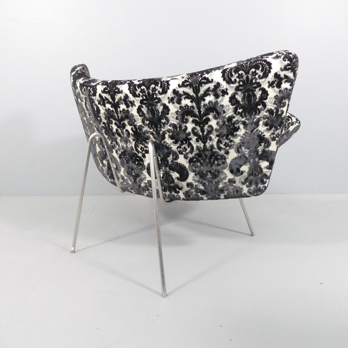 2014 - A contemporary design lounge chair on steel rod base. WITH THE OPTION TO PURCHASE THE FOLLOWING LOT ... 