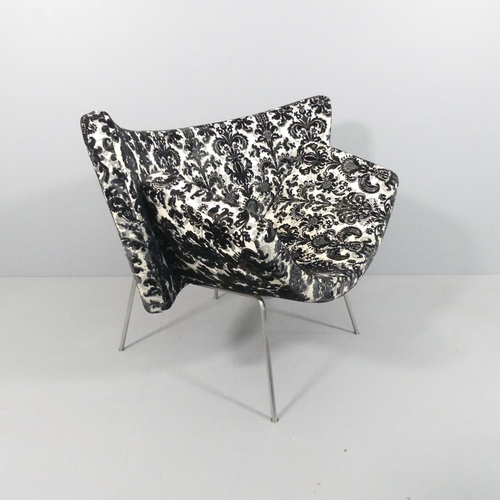 2015 - A contemporary design lounge chair on steel rod base.