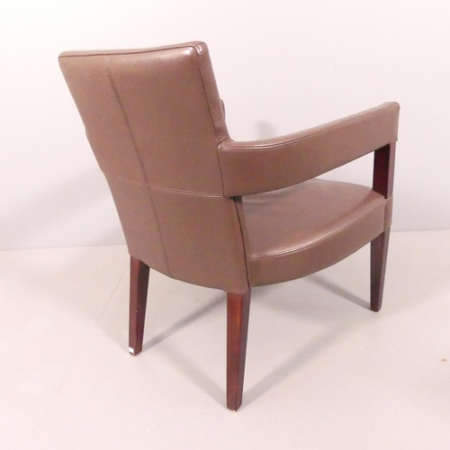 2022 - A contemporary design leather lounge chair. Overall 65x82x66cm, seat 55x39x52cm. WITH THE OPTION TO ... 