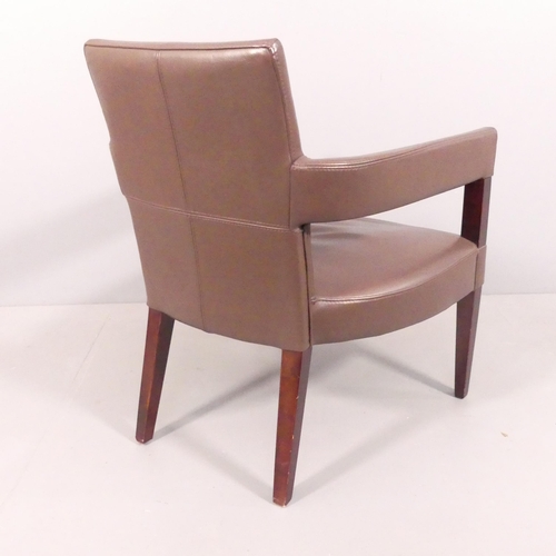 2023 - A contemporary design leather lounge chair. Overall 65x82x66cm, seat 55x39x52cm.