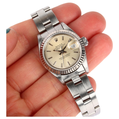 1097 - ROLEX - a lady's stainless steel Oyster Perpetual Datejust automatic bracelet watch, ref. 69174, cir... 