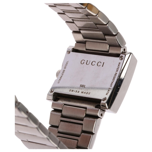 1099 - GUCCI - a lady's stainless steel 100L quartz bracelet watch, circa 1992, white mother-of-pearl dial ... 