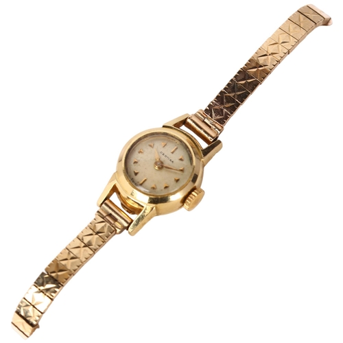 1072 - CERTINA - a lady's Swiss 18ct gold mechanical bracelet watch, circa 1960s, silvered dial with applie... 