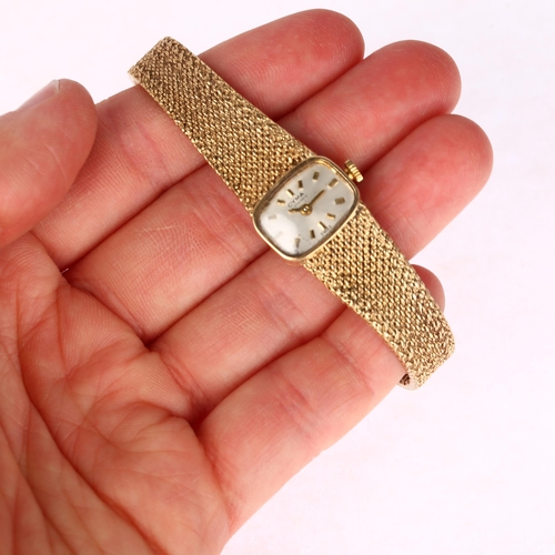 1073 - CYMA - a lady's 9ct gold mechanical bracelet watch, circa 1970s, silvered dial with applied gilt bat... 