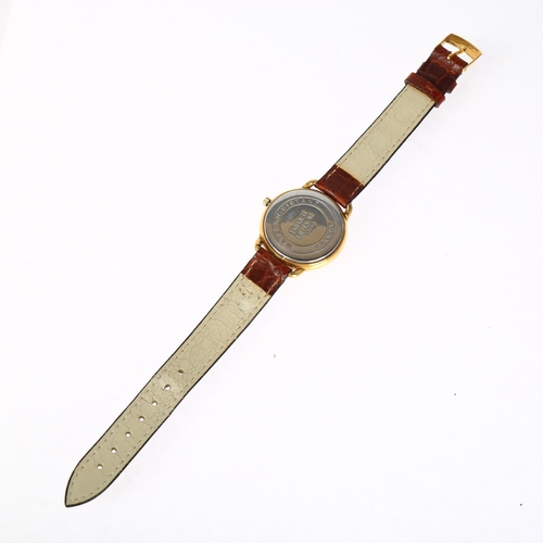 1077 - EMERICH MEERSON - a lady's gold plated stainless steel Officer's style quartz wristwatch, white dial... 