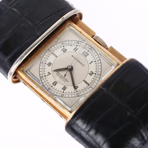 1083 - MOVADO - an Art Deco gold plated leather Ermeto chronometer travelling purse watch, circa 1930, squa... 