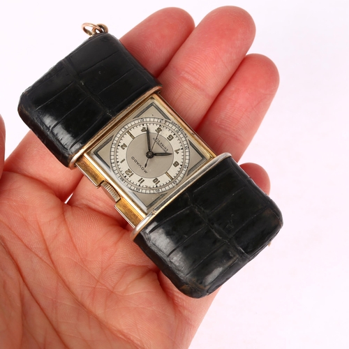 1083 - MOVADO - an Art Deco gold plated leather Ermeto chronometer travelling purse watch, circa 1930, squa... 