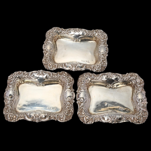 1679 - A set of 3 late Victorian silver dishes, Ridley & Hayes, Chester 1899, shaped rectangular form, with... 