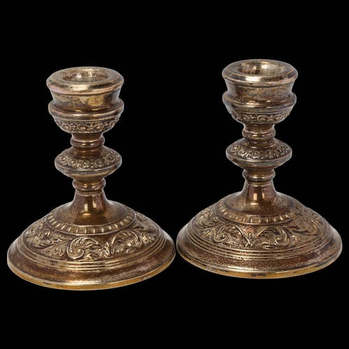 1695 - A pair of Elizabeth II silver filled squat table candlesticks, maker B & Co, Birmingham 1988, 11cm