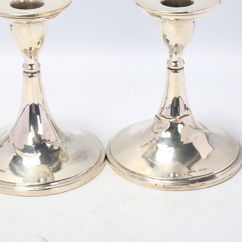 1696 - A pair of George V silver table candlesticks, S Blanckensee & Son Ltd, Birmingham 1925, 13.5cm, weig... 