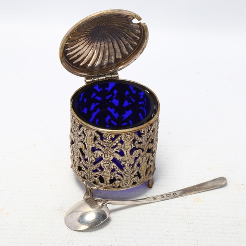 1699 - A Continental white metal mustard pot with blue glass liner, and English silver spoon, pot height 7.... 