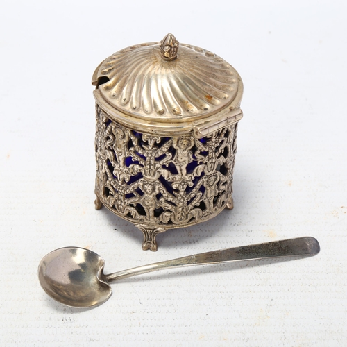 1699 - A Continental white metal mustard pot with blue glass liner, and English silver spoon, pot height 7.... 