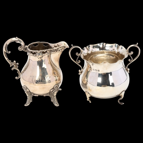 1702 - An Edwardian silver 2-handled sugar bowl, and a German silver cream jug, height 9cm, 7.9oz total (2)