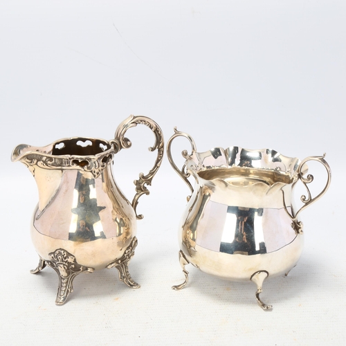 1702 - An Edwardian silver 2-handled sugar bowl, and a German silver cream jug, height 9cm, 7.9oz total (2)