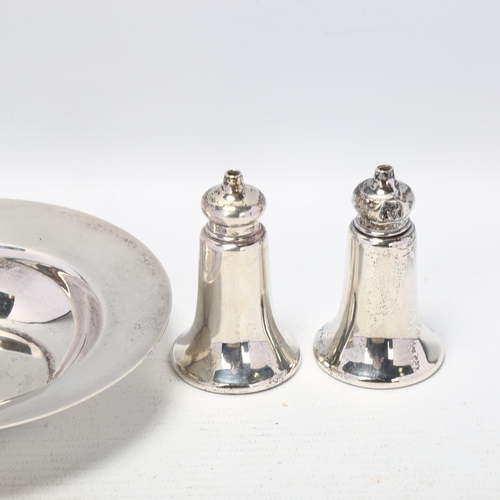 1704 - An Elizabeth II silver Armada dish, and a pair of silver pepperettes, 4.7oz total (3)