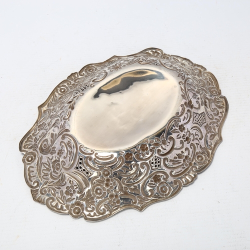 1708 - A Victorian silver table centre bowl, William Aitken, Chester 1884, allover relief embossed foliate ... 