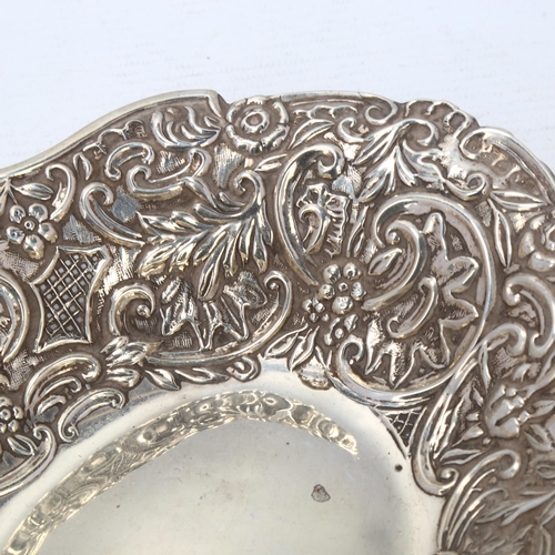 1708 - A Victorian silver table centre bowl, William Aitken, Chester 1884, allover relief embossed foliate ... 