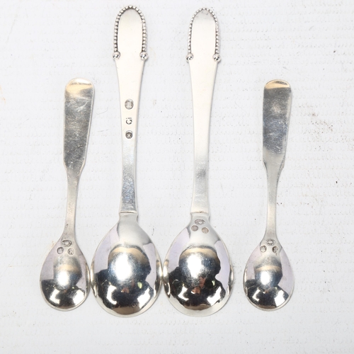 1715 - GEORG JENSEN - a pair of Art Deco Danish silver Kugel pattern mustard spoons, and a pair of Perl pat... 