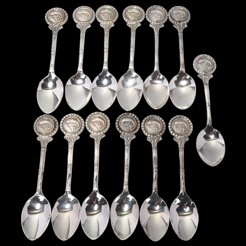 1724 - A set of 13 Elizabeth II silver carp fishing teaspoons, 12cm, 8oz total