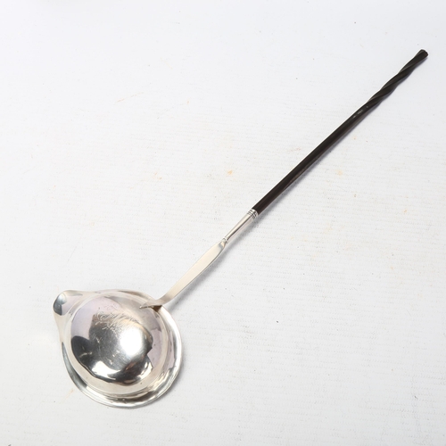 1726 - A Georgian silver whale bone toddy ladle, 34cm