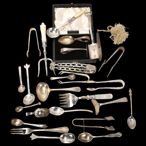 1727 - Various silver and plated flatware, including shovel caddy spoon, sugar tongs, mother-of-pearl handl... 