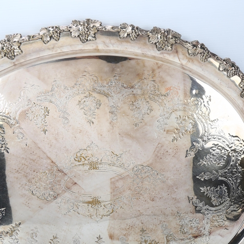 1745 - A large Victorian silver plated 2-handled tea tray, with ebonised handles and grapevine rim, 65cm