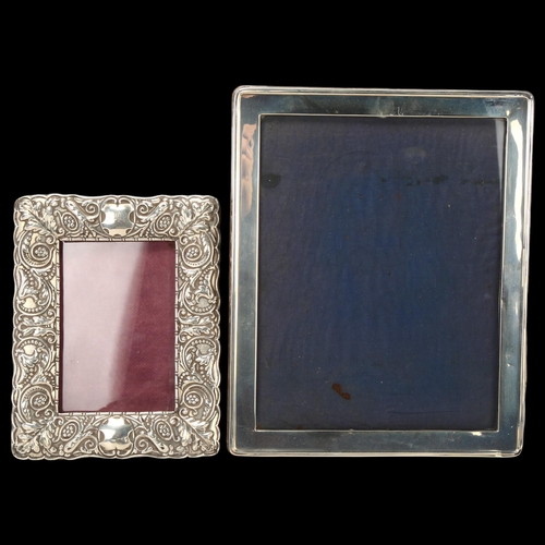 1749 - 2 silver-fronted strut photo frames, largest 27cm x 22cm (2)