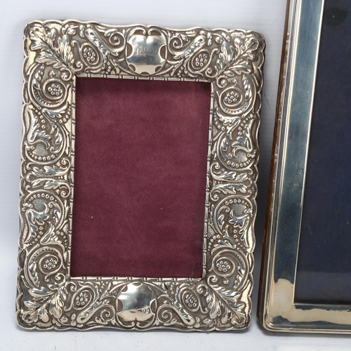 1749 - 2 silver-fronted strut photo frames, largest 27cm x 22cm (2)