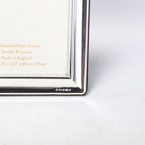 1750 - 2 Elizabeth II silver-fronted photo frames, largest overall 25cm x 20cm (2)