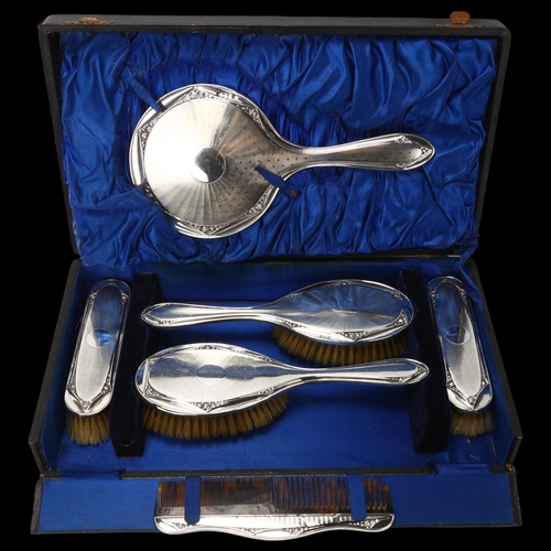 1756 - A cased Art Deco silver 6-piece travelling dressing table set, William Adams Ltd, mirror 28cm