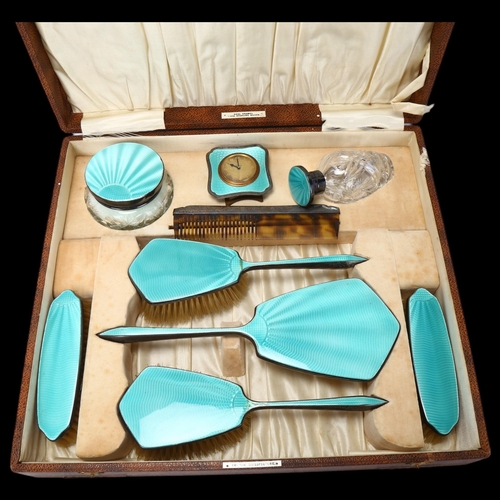 1757 - An Art Deco George V silver and teal enamel 9-piece dressing table set, Daniel Manufacturing Co, Bir... 