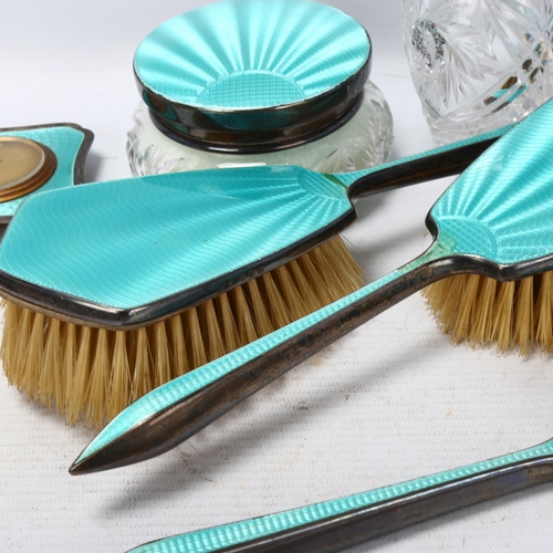 1757 - An Art Deco George V silver and teal enamel 9-piece dressing table set, Daniel Manufacturing Co, Bir... 