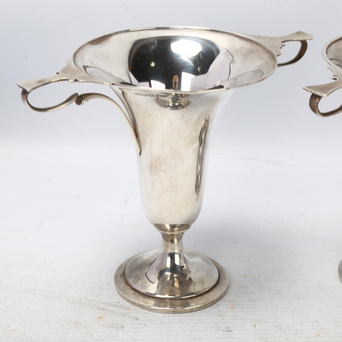 1759 - A pair of George V silver trophy cups, Walker & Hall, Sheffield 1913, 13cm, 9.2oz total