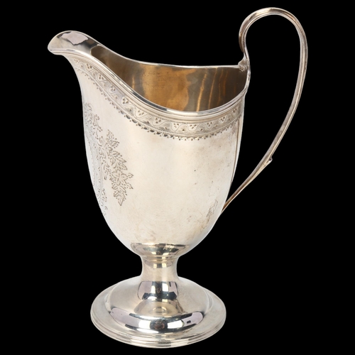 1770 - A Victorian silver helmet cream jug, Aldwinckle & Slater, London 1887, bright-cut engraved floral de... 