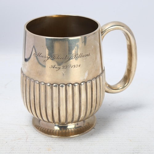 1777 - An Edwardian silver half pint christening mug, Charles Stuart Harris, London 1904, relief embossed h... 