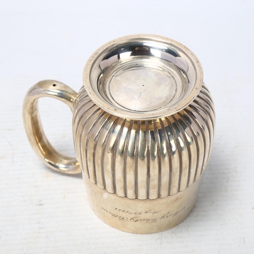 1777 - An Edwardian silver half pint christening mug, Charles Stuart Harris, London 1904, relief embossed h... 