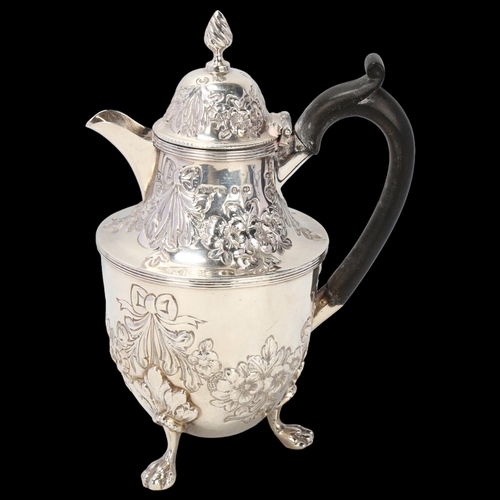 1780 - A Victorian silver bachelor's teapot, Nathan & Hayes, Birmingham 1892, relief embossed floral swag d... 