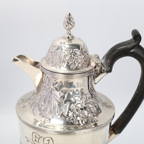 1780 - A Victorian silver bachelor's teapot, Nathan & Hayes, Birmingham 1892, relief embossed floral swag d... 