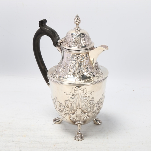 1780 - A Victorian silver bachelor's teapot, Nathan & Hayes, Birmingham 1892, relief embossed floral swag d... 