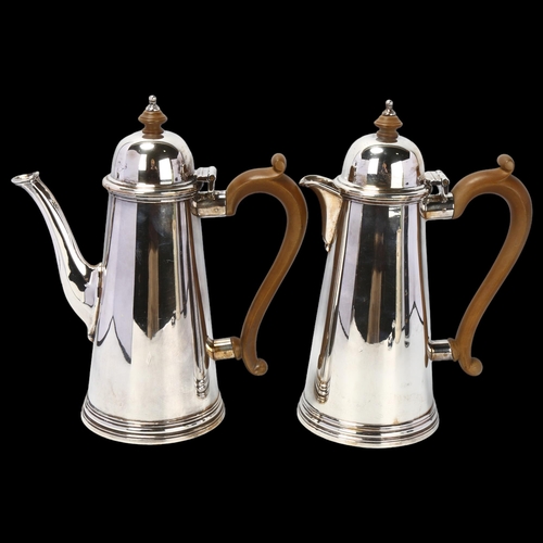 1782 - A pair of Elizabeth II silver cafe-au-lait pots, William Comyns, London 1961, tapered cylindrical fo... 