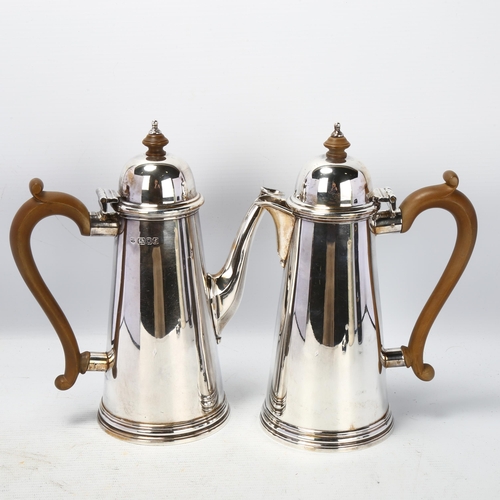 1782 - A pair of Elizabeth II silver cafe-au-lait pots, William Comyns, London 1961, tapered cylindrical fo... 