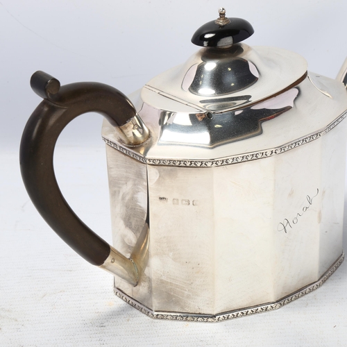 1783 - A George V silver teapot, S Blanckensee & Son Ltd, Birmingham 1925, faceted oval form, with turned w... 