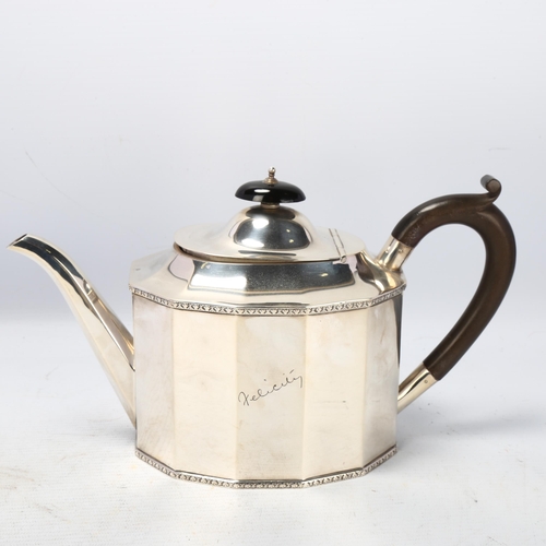 1783 - A George V silver teapot, S Blanckensee & Son Ltd, Birmingham 1925, faceted oval form, with turned w... 