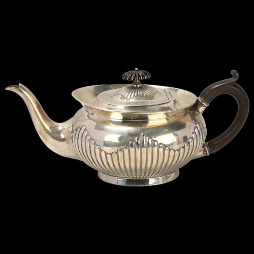 1788 - An Edwardian silver teapot, William Hutton & Sons Ltd, London 1904, oval form, with relief embossed ... 