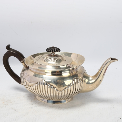 1788 - An Edwardian silver teapot, William Hutton & Sons Ltd, London 1904, oval form, with relief embossed ... 