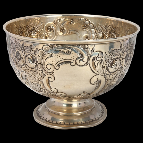 1790 - An Edwardian silver pedestal rose bowl, James Charles Jay, Chester 1903, relief embossed floral deco... 