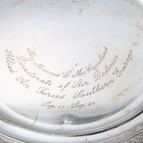 1797 - A German circular 800 silver salver, engine turned decoration, military inscription 