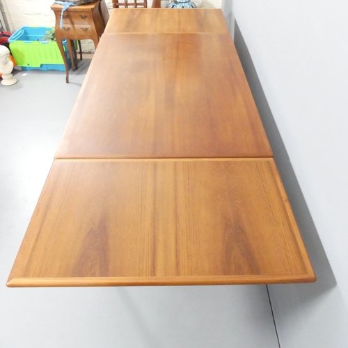 2027 - A contemporary teak draw-leaf extending dining table, 130 (extending to 239cm)x74x86cm, with four ma... 